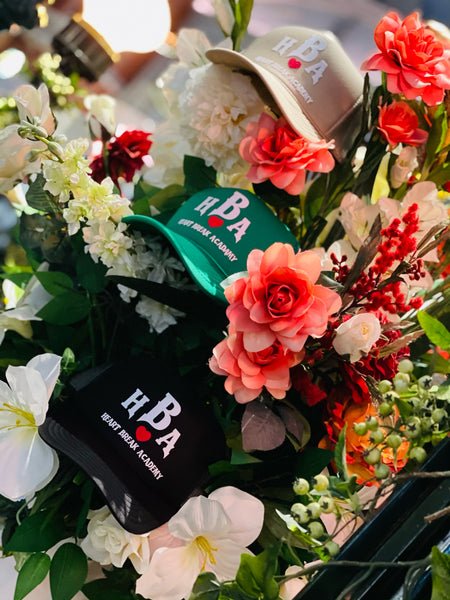 Heart Break Academy Trucker hats